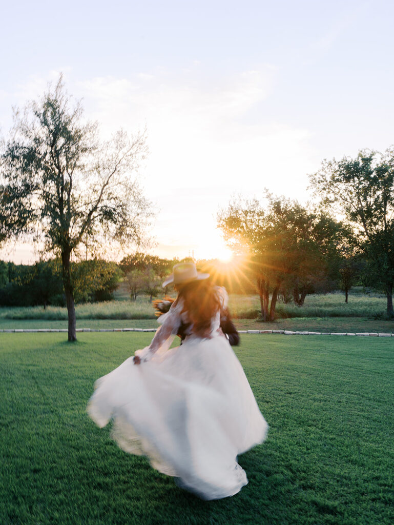 Bride and groom at The Adelphia wedding editorial in Lampasas, TX, surrounded by romantic florals and southern charm