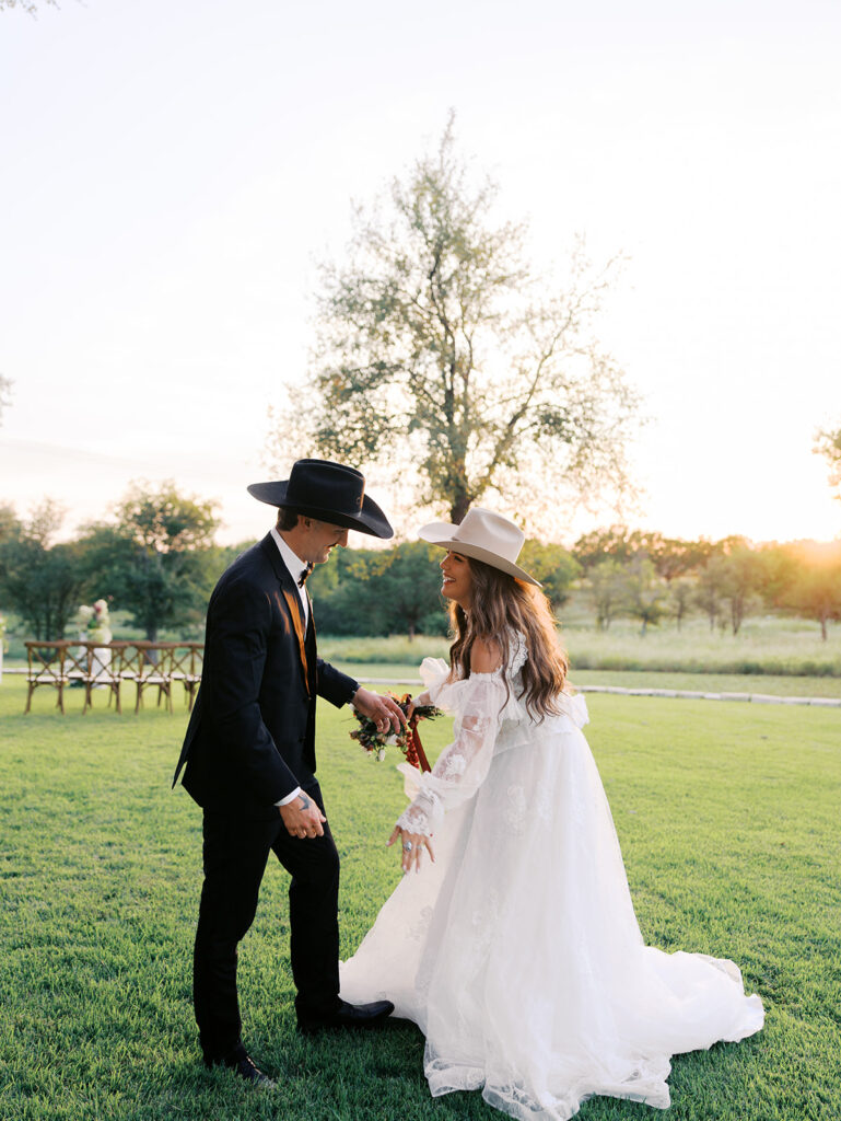 Bride and groom at The Adelphia wedding editorial in Lampasas, TX, surrounded by romantic florals and southern charm