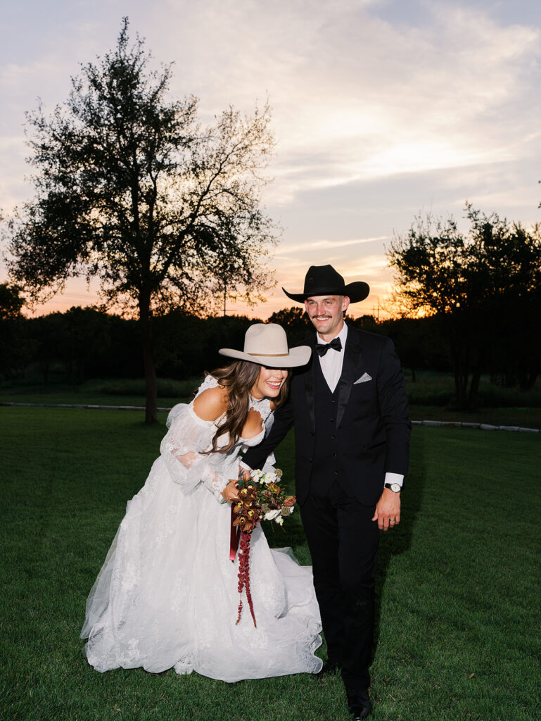 Bride and groom at The Adelphia wedding editorial in Lampasas, TX, surrounded by romantic florals and southern charm