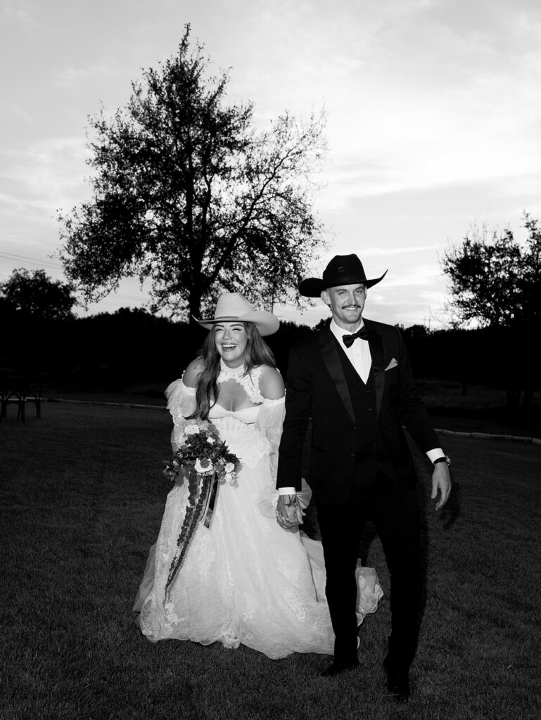 Bride and groom at The Adelphia wedding editorial in Lampasas, TX, surrounded by romantic florals and southern charm