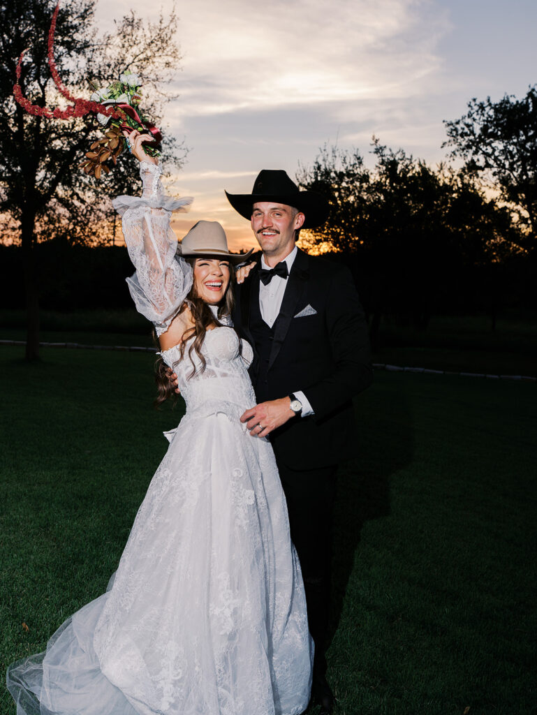 Bride and groom at The Adelphia wedding editorial in Lampasas, TX, surrounded by romantic florals and southern charm