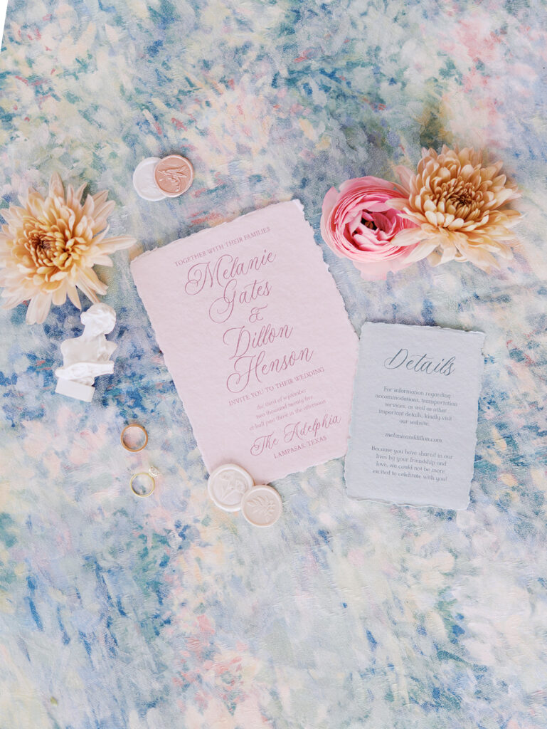 Refined wedding flat lay featuring romantic stationery by Anna & Ink, delicate florals, and timeless southern details.