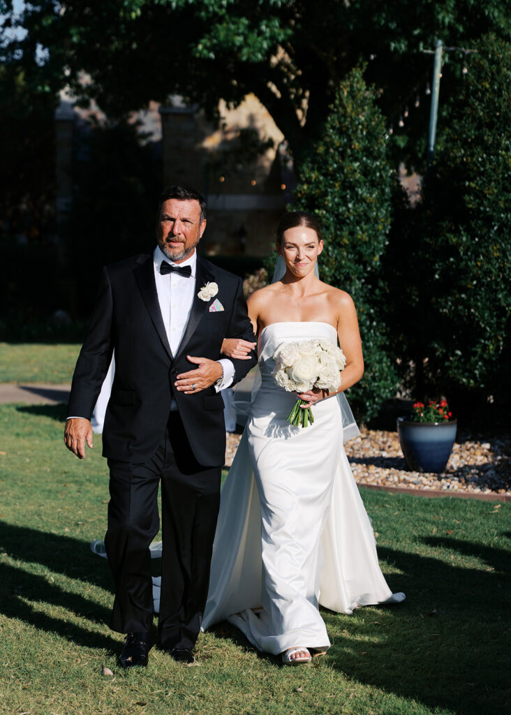Elegant Texas wedding ceremony surrounded by family and friends
