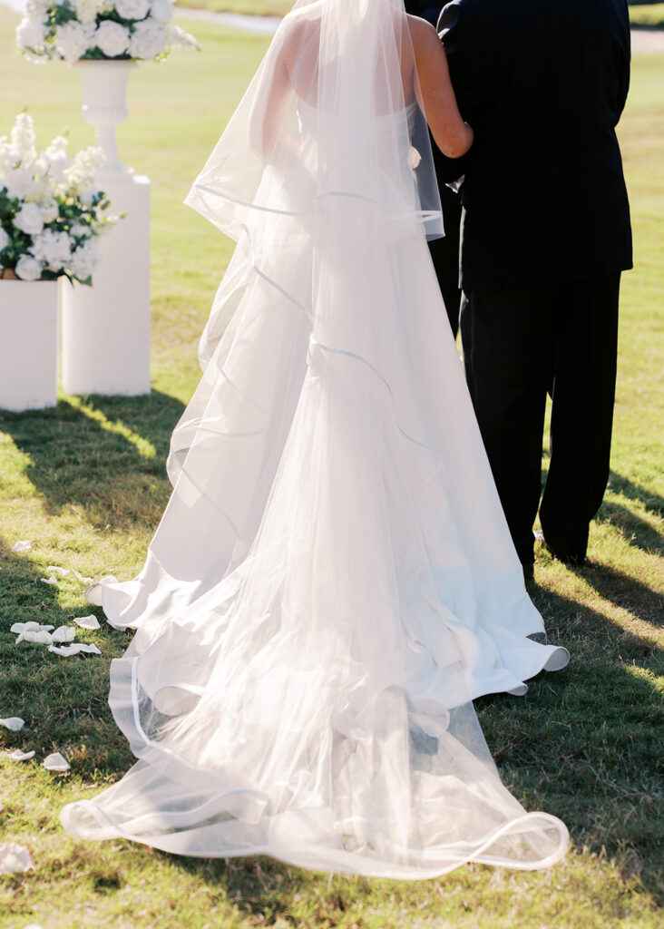 Elegant Texas wedding ceremony surrounded by family and friends