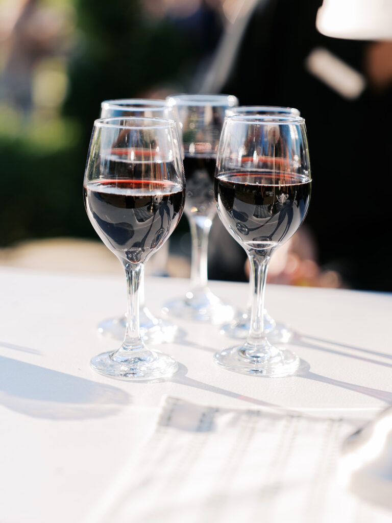 Candid moments during cocktail hour at Texas country club wedding