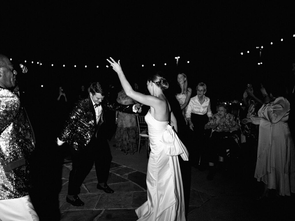 Guests celebrating during lively Texas wedding reception