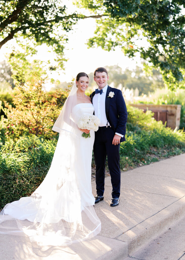 Bride and groom portraits in golden hour light during elegant Texas wedding photography