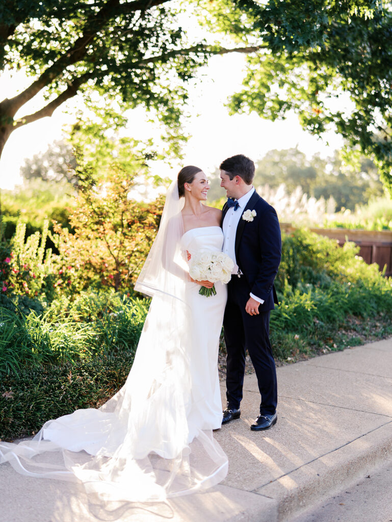 Bride and groom portraits in golden hour light during elegant Texas wedding photography