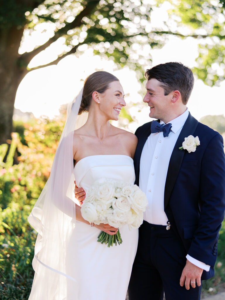 Bride and groom portraits in golden hour light during elegant Texas wedding photography