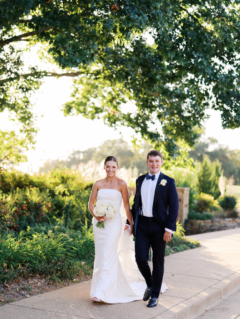 Bride and groom portraits in golden hour light during elegant Texas wedding photography