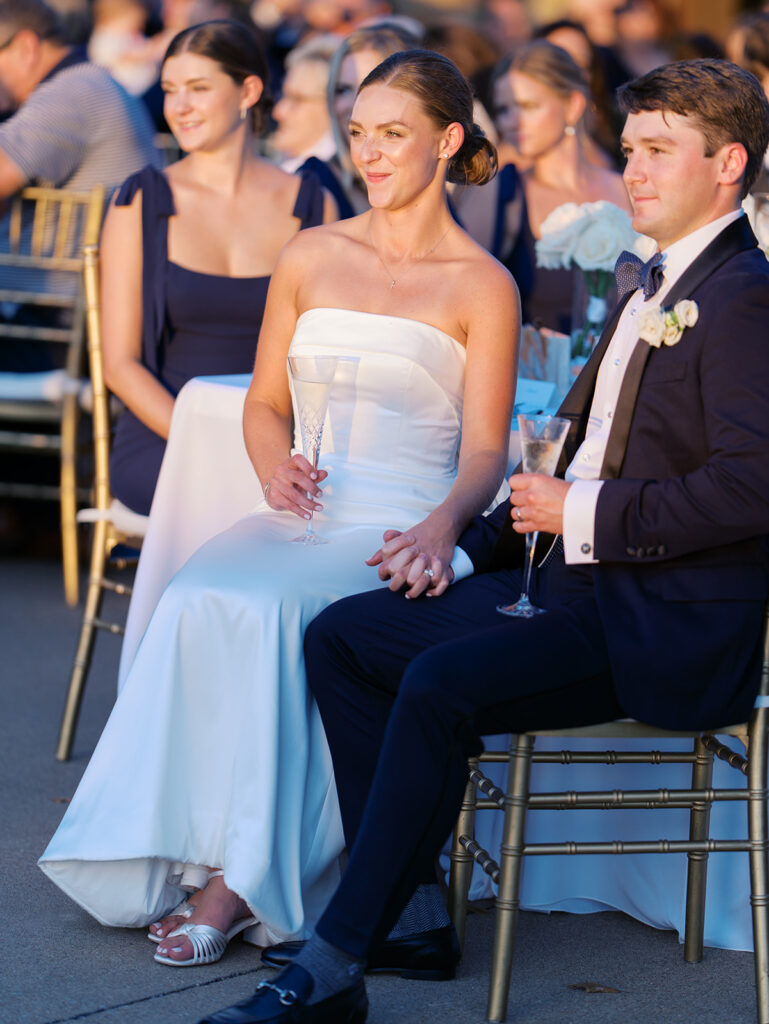 Elegant Texas wedding reception with candlelit tables and dancing guests