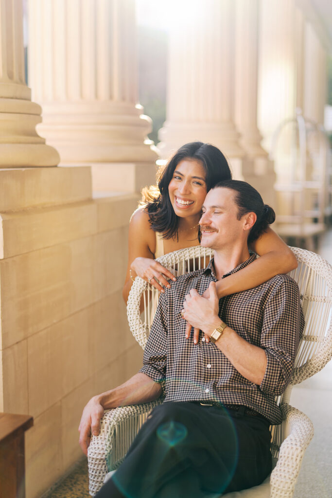 Hotel Ella columns and courtyard used as engagement photo backdrop in Austin