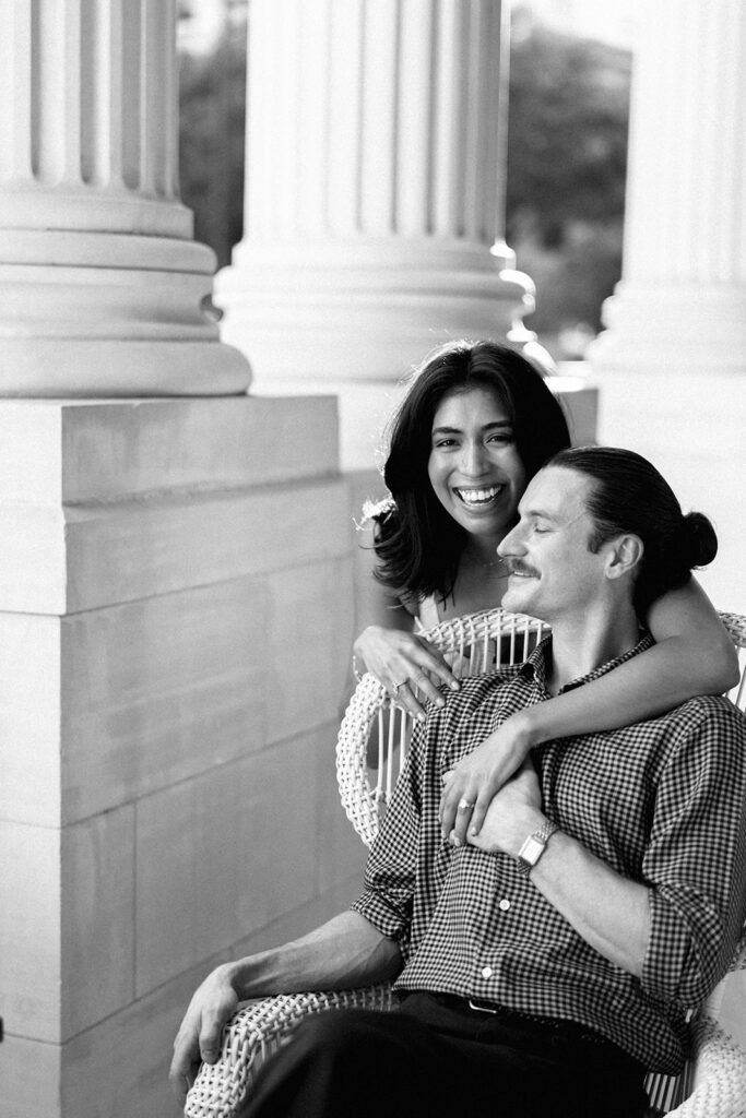 Hotel Ella columns and courtyard used as engagement photo backdrop in Austin