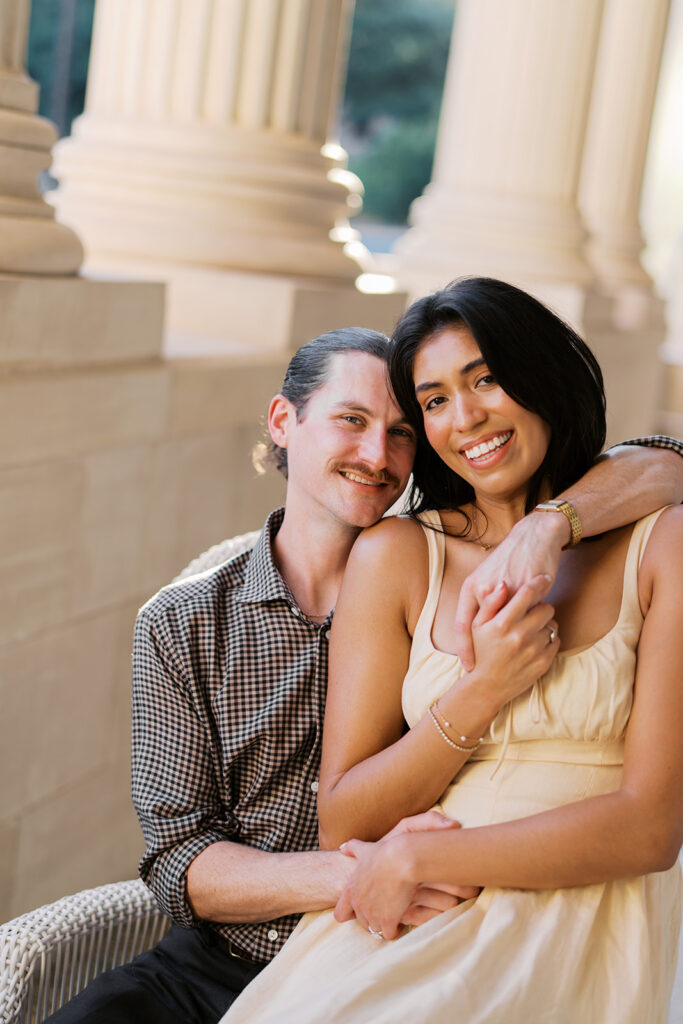 Hotel Ella columns and courtyard used as engagement photo backdrop in Austin