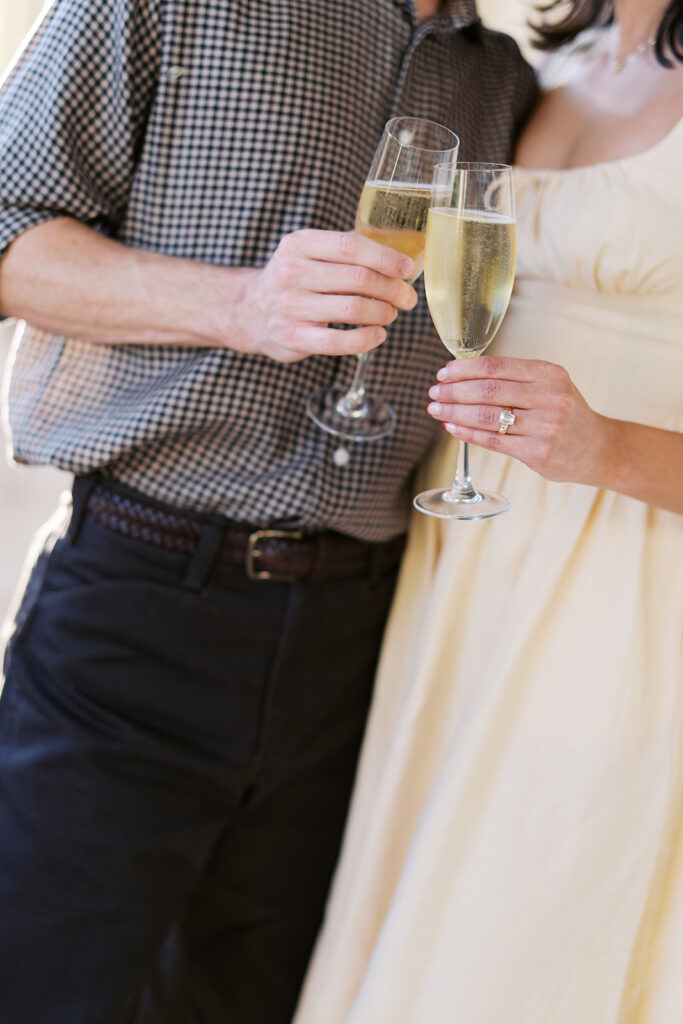 Hotel Ella columns and courtyard used as engagement photo backdrop in Austin