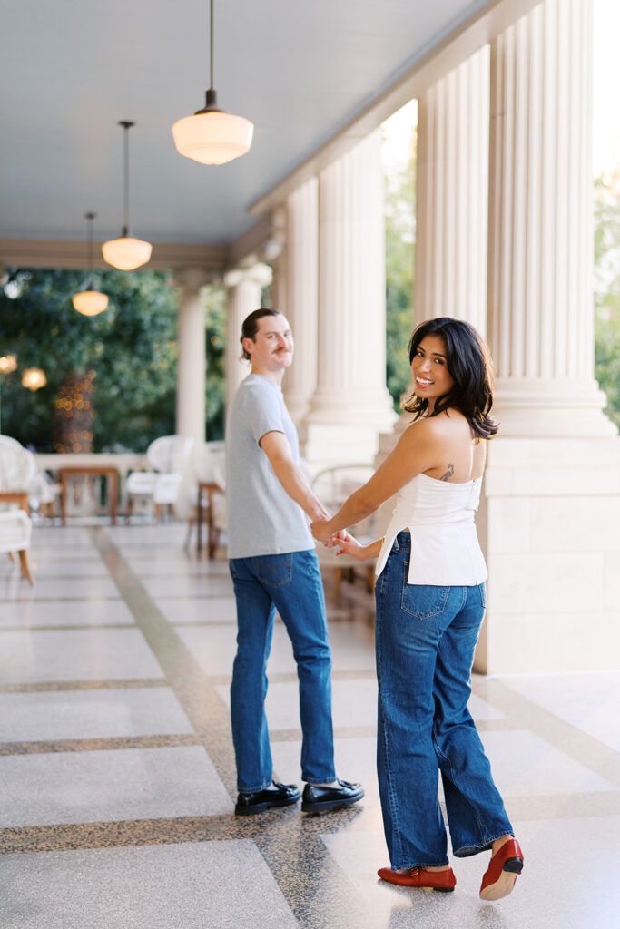 Joyful film-inspired engagement photos at Hotel Ella in downtown Austin