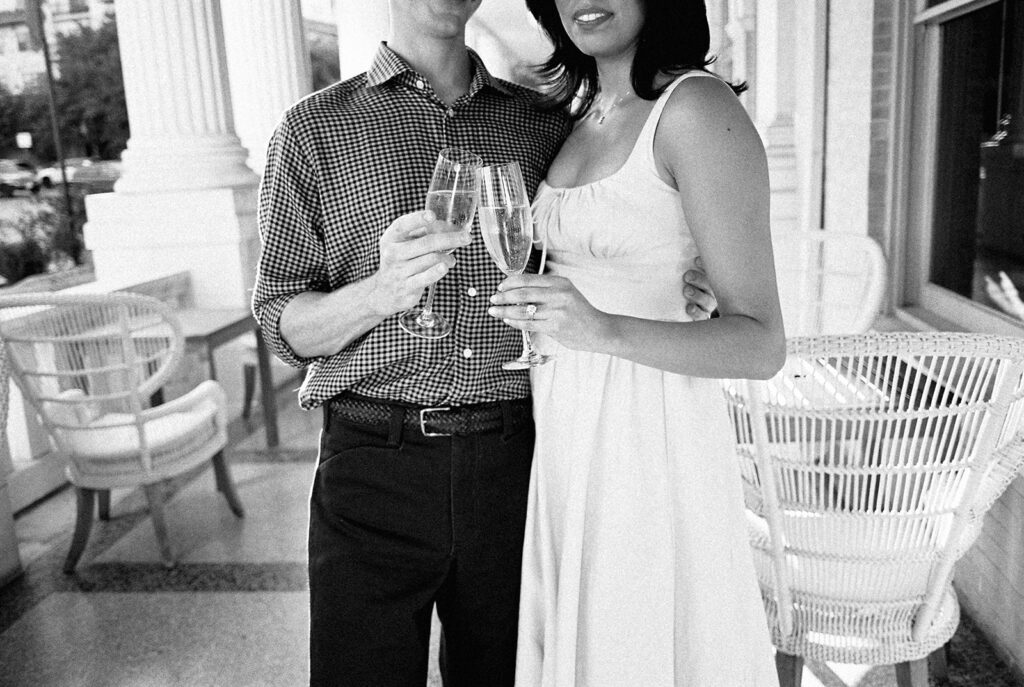 Hotel Ella columns and courtyard used as engagement photo backdrop in Austin