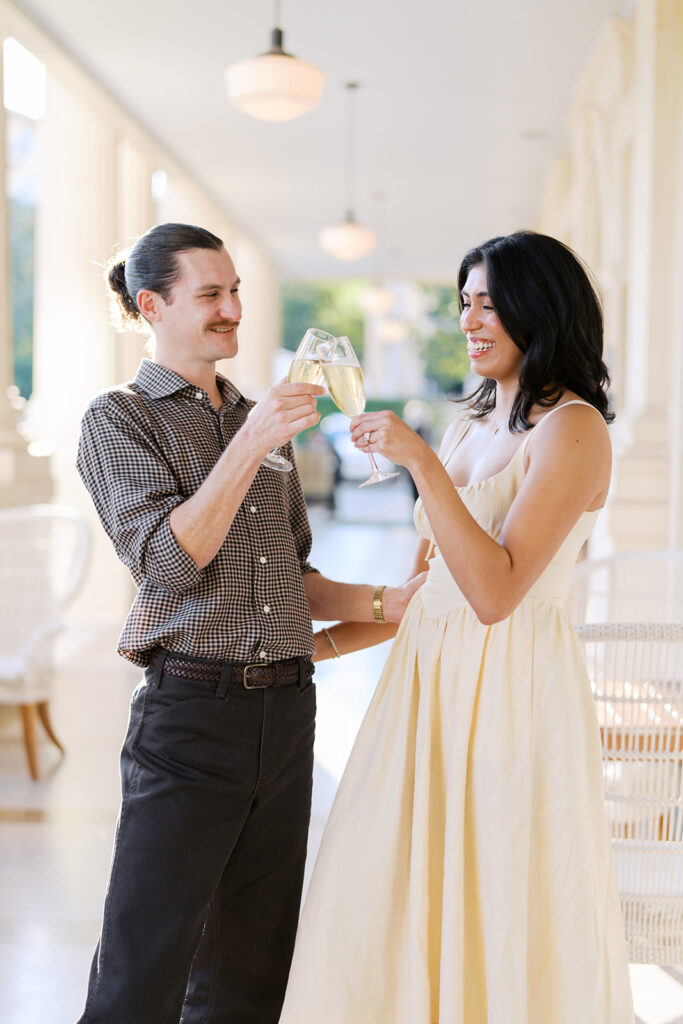 Hotel Ella columns and courtyard used as engagement photo backdrop in Austin
