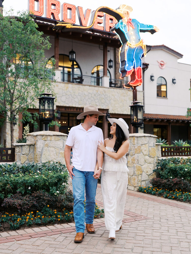 Playful couple laughing together during Fort Worth engagement photos