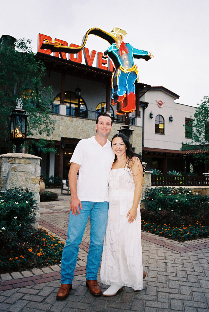 Playful couple laughing together during Fort Worth engagement photos