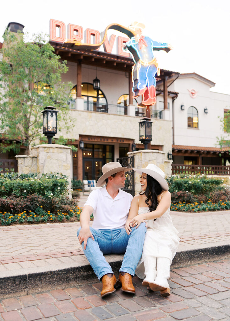 Romantic engagement portraits in golden hour light at Hotel Drover