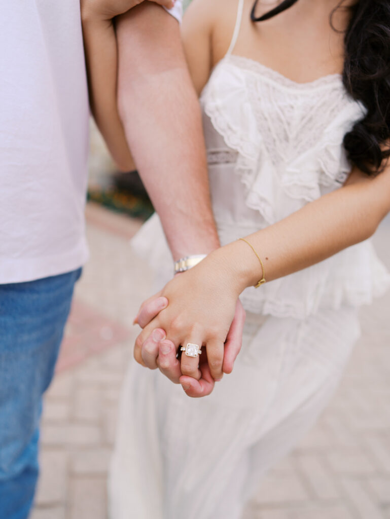 Playful couple laughing together during Fort Worth engagement photos