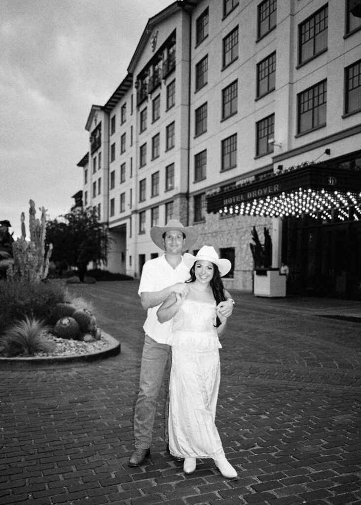 Romantic engagement portraits in golden hour light at Hotel Drover