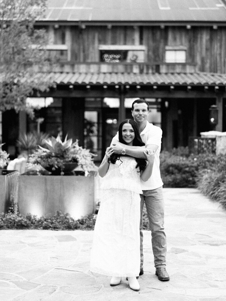 Romantic engagement portraits in golden hour light at Hotel Drover