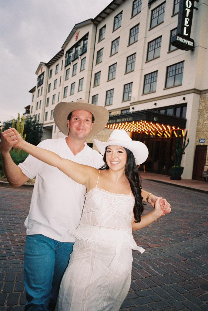 Romantic engagement portraits in golden hour light at Hotel Drover