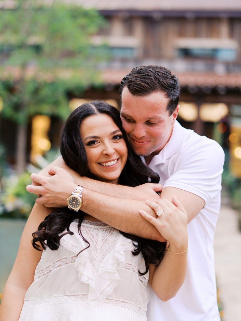 Romantic engagement portraits in golden hour light at Hotel Drover