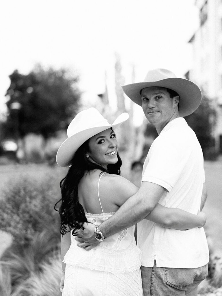 Romantic engagement portraits in golden hour light at Hotel Drover