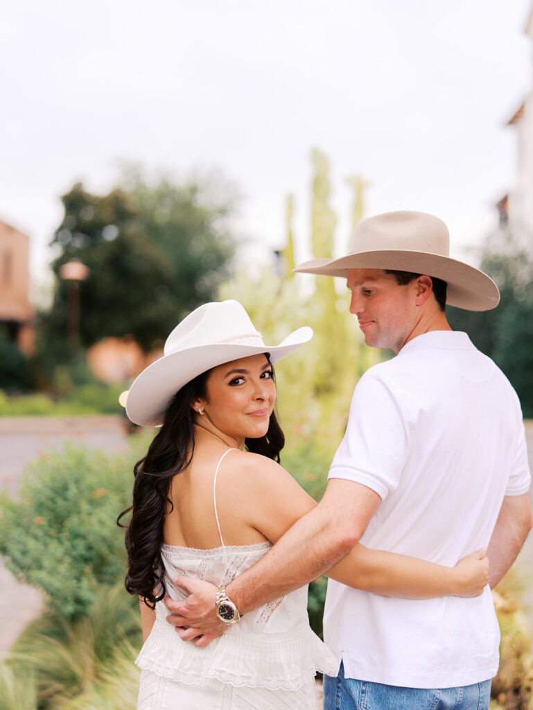 Romantic engagement portraits in golden hour light at Hotel Drover