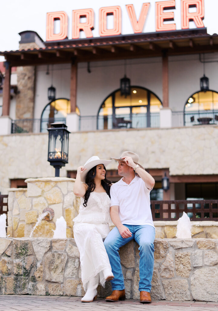 Romantic engagement portraits in golden hour light at Hotel Drover