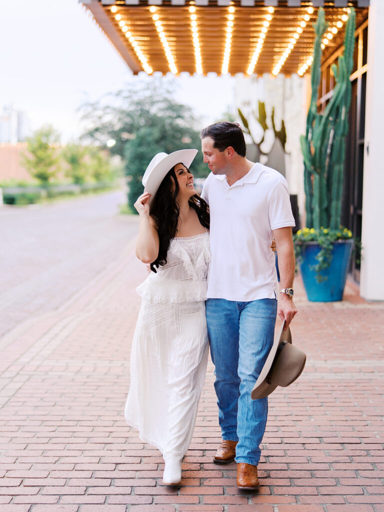 Romantic engagement portraits in golden hour light at Hotel Drover