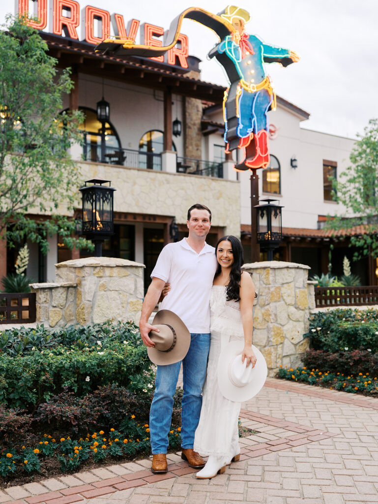 Playful couple laughing together during Fort Worth engagement photos