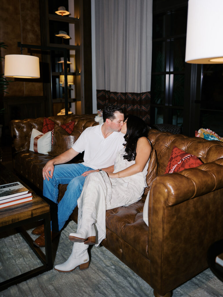 Playful couple laughing together during Fort Worth engagement photos