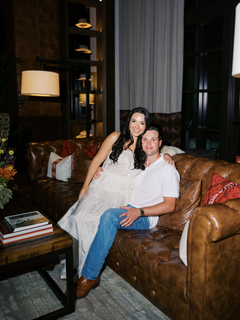 Playful couple laughing together during Fort Worth engagement photos