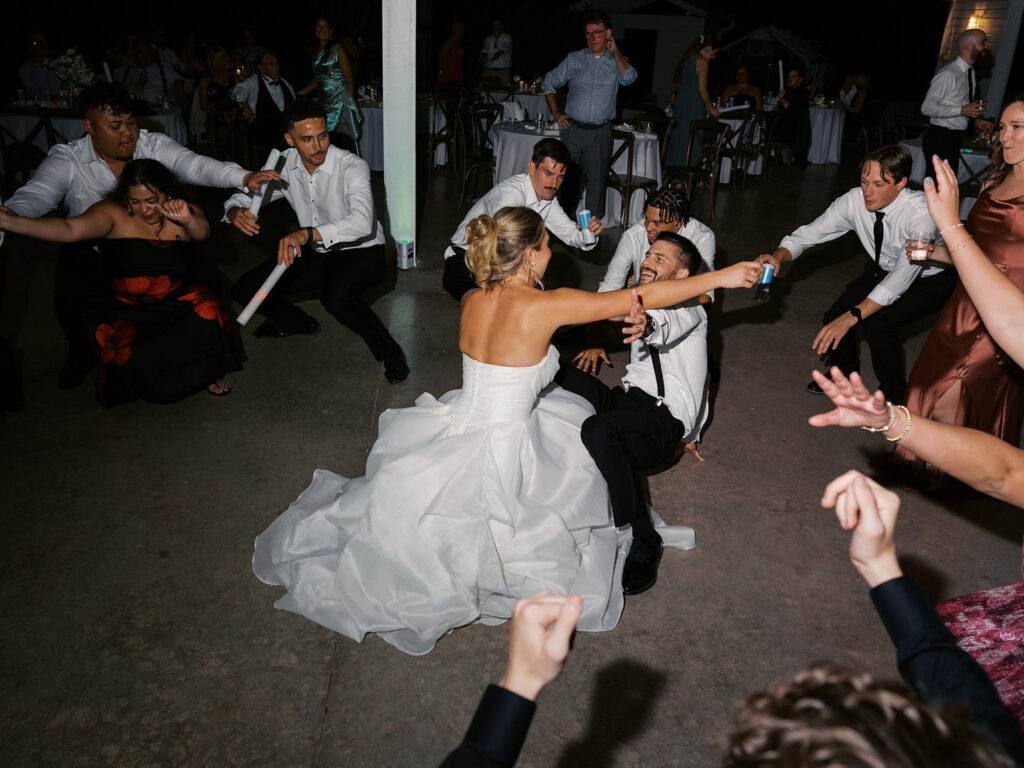 Guests celebrating at outdoor wedding reception in Austin Texas
