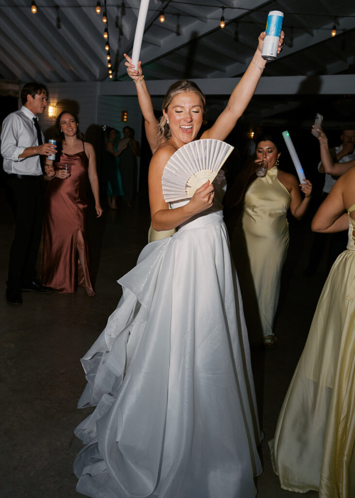 Guests celebrating at outdoor wedding reception in Austin Texas