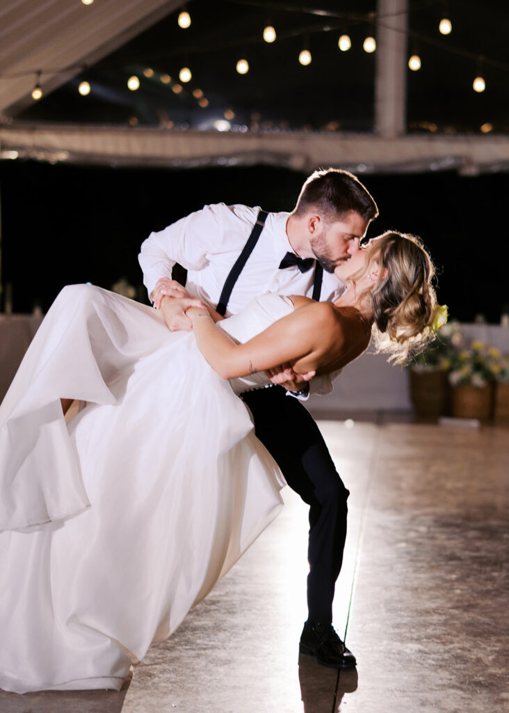 Guests celebrating at outdoor wedding reception in Austin Texas