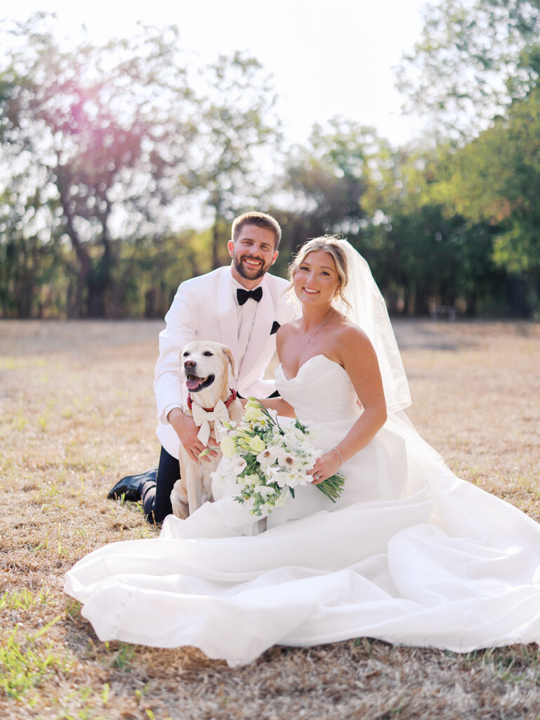 Joyful couple walking through garden at The Winfield Inn wedding