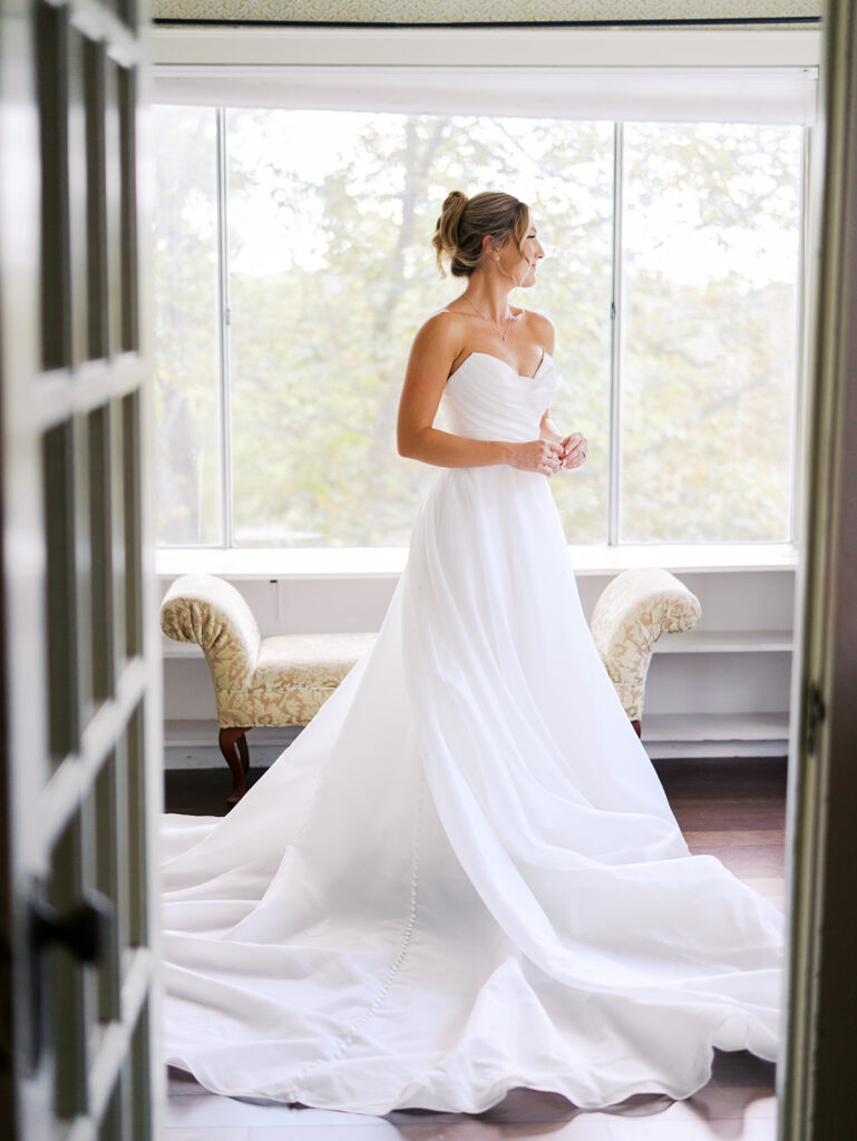 Bride getting ready on wedding morning at The Winfield Inn