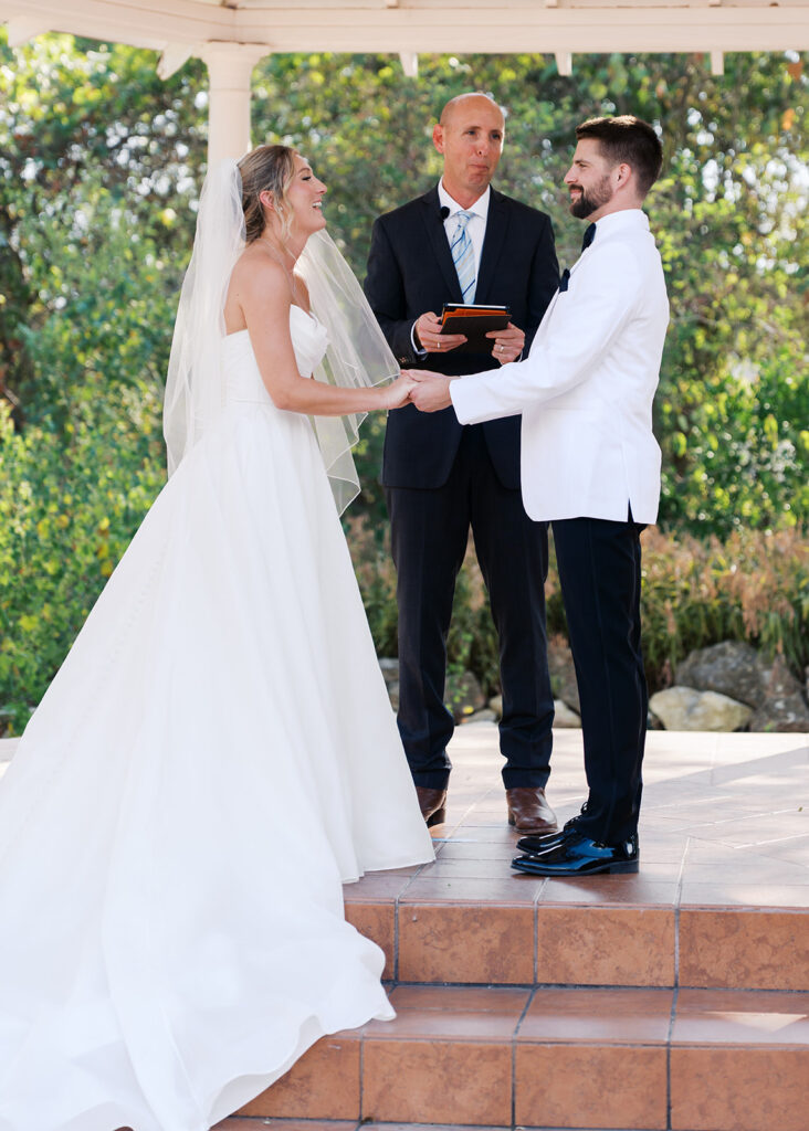 Outdoor ceremony under oak trees at The Winfield Inn in Austin