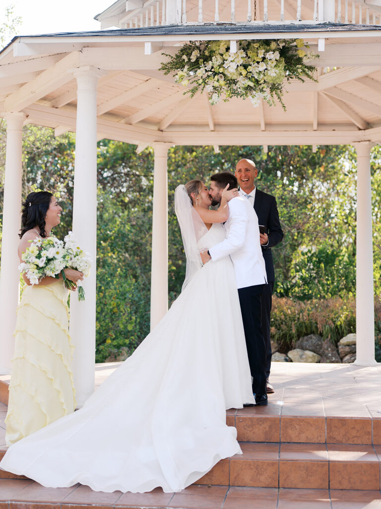 Outdoor ceremony under oak trees at The Winfield Inn in Austin