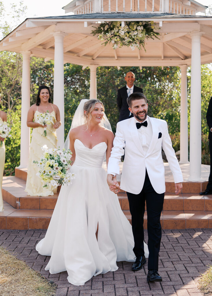Outdoor ceremony under oak trees at The Winfield Inn in Austin