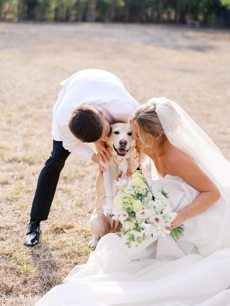 Joyful couple walking through garden at The Winfield Inn wedding
