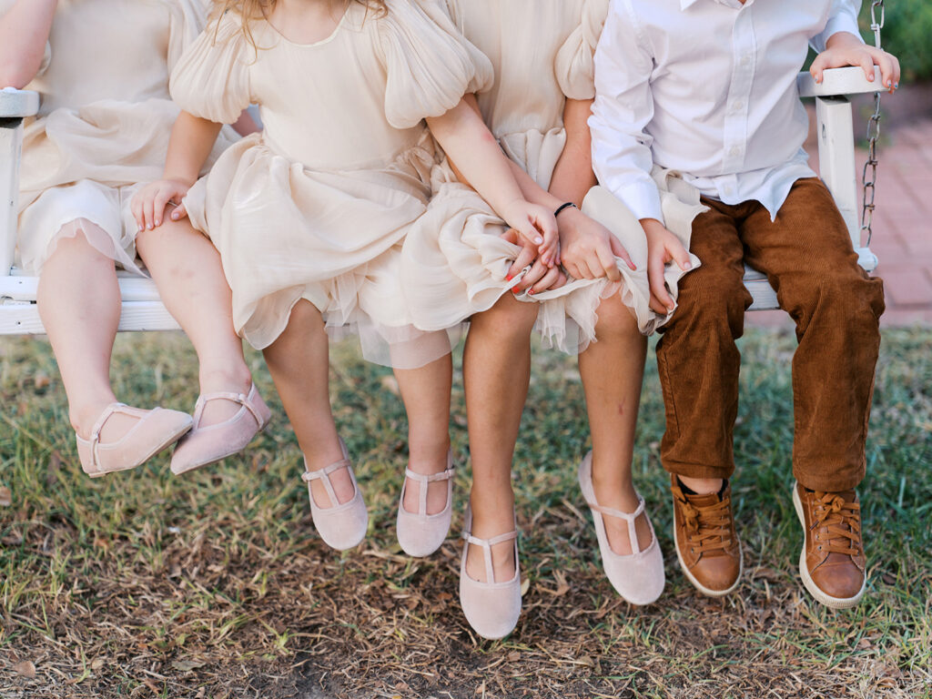 Joyful couple walking through garden at The Winfield Inn wedding