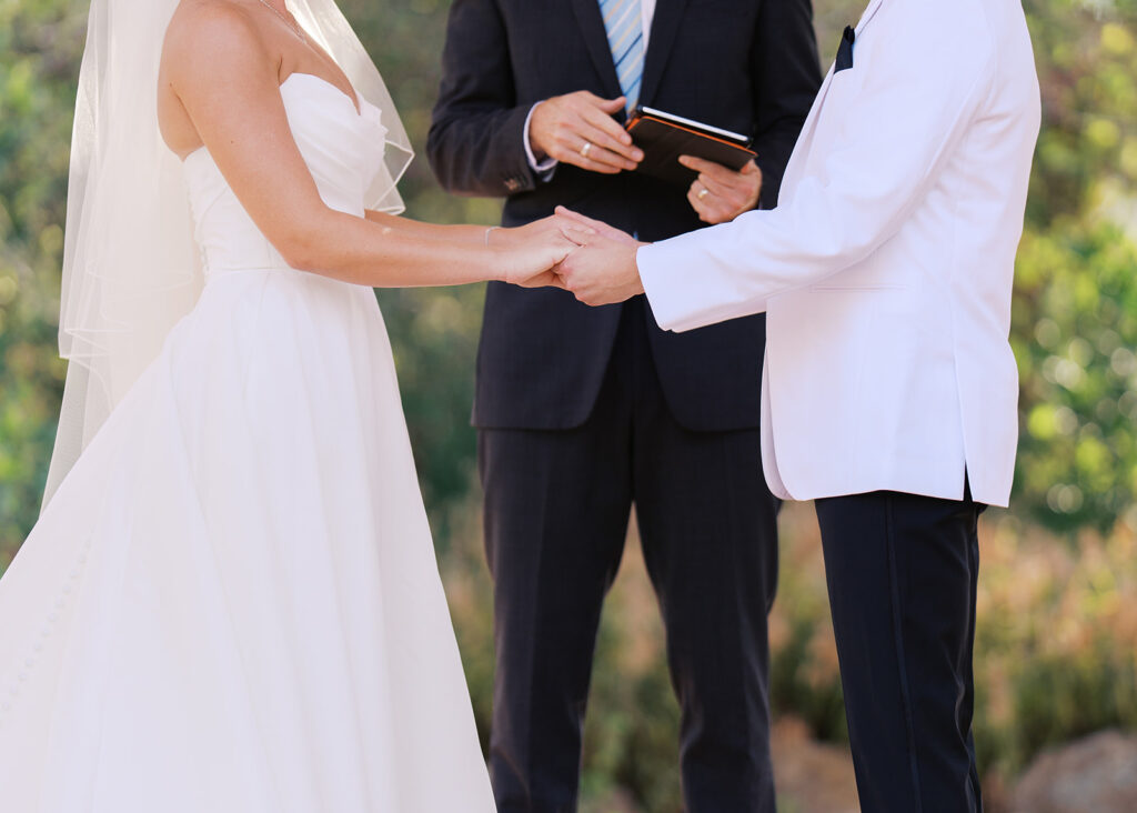 Outdoor ceremony under oak trees at The Winfield Inn in Austin