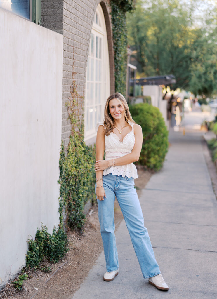 Joyful Austin senior photo on South Congress at golden hour on film