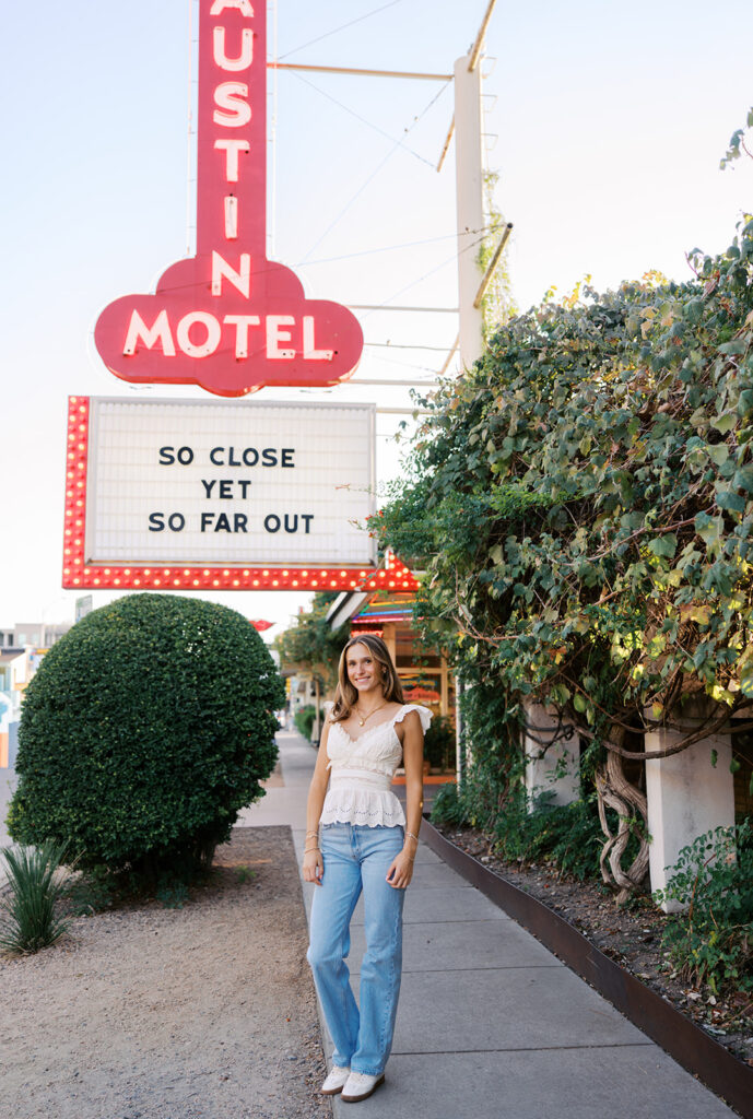 Joyful Austin senior photo on South Congress at golden hour on film